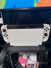 Nintento Switch pari al nuovo +custodia Mario bros