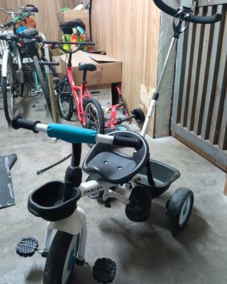 Triciclo con manubrio genitori