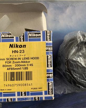 Nikon HN 23 lens hood zoom 80. 200 F4 in alluminio