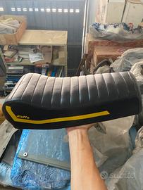 Sella “replica super bravo”