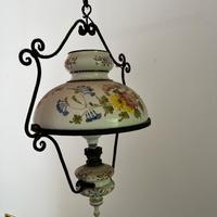 Lampadario vintage in ceramica e ferro battuto