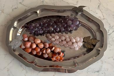 Uva decorativa vintage in pietra