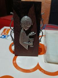 Bambino in peltro cesellato a mano vintage