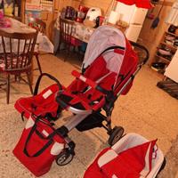 Passeggino rosso + accessori