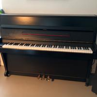 Pianoforte verticale nieer usato