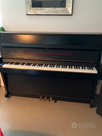 Pianoforte verticale nieer usato