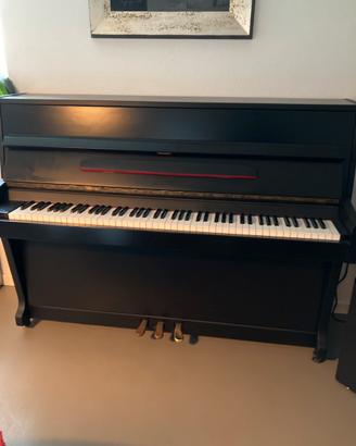 Pianoforte verticale nieer usato