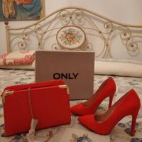 Décolleté e pochette rosso corallo