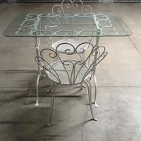 Tavolo, sedie e panchina in ferro battuto dà giard