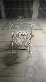 Tavolo, sedie e panchina in ferro battuto dà giard