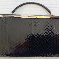 Pochette in vera pelle di coccodrillo