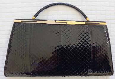 Pochette in vera pelle di coccodrillo