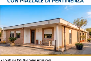 Locale pluri uso con area di pertinenza