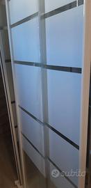 Box doccia in cristallo e piatto in ceramica