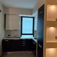 Cucina legno rovere ed elettrodomestici Smeg