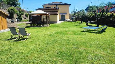 Casa Vacanze giardino e posto auto