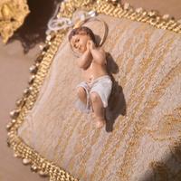 bambinelli in prezioso cuscino