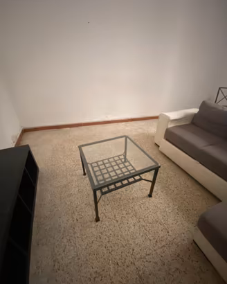 Tavolino in ferro ripiano vetro