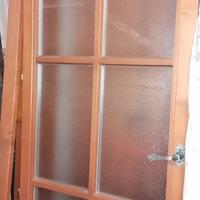 Porta in legno con doppi vetri 