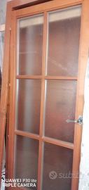 Porta in legno con doppi vetri 