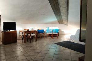 Confortevole Mansarda Santa Giusta o stanza