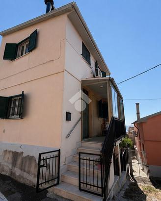 PORZIONE DI BIFAMILIARE A MOZZAGROGNA