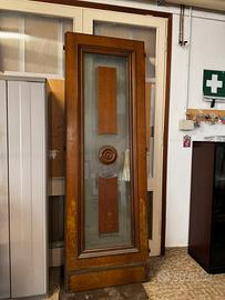 Doppia porta in legno e vetro per veranda