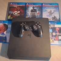 Playstation 4, con controller e giochi 