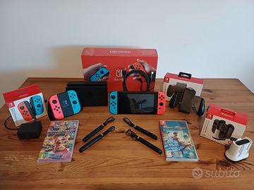 Nintendo Switch V2 + 4 JoyCon originali + 2 giochi