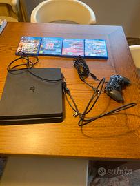 PlayStation 4 1T con giochi e joystick