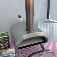 Forno Ooni Karu 12 con bruciatore e pala