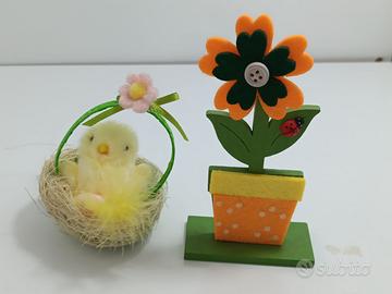 Pulcino nel cestino e fiore in feltro