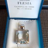 CIONDOLO CON CORNICE IN ORO BIANCO E INCASTONATO T