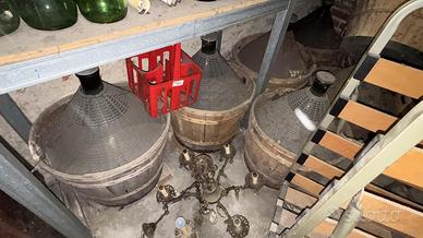 Damigiane in vetro rivestite