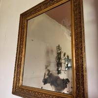 Specchio antico in stile dorato
