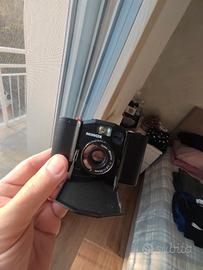 Minox GL con custodia originale in pelle rossa