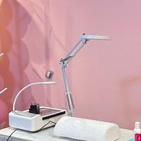 Lampada con lenti di ingrandimento