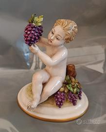 Statuina di Bacco in porcellana Capodimonte