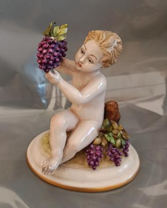 Statuina di Bacco in porcellana Capodimonte