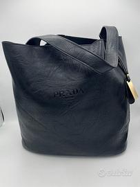 Borsa verticale da spalla con pochette