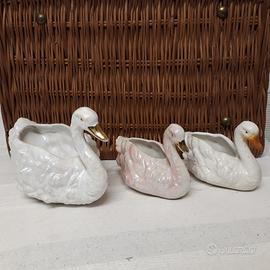 Cigni in ceramica