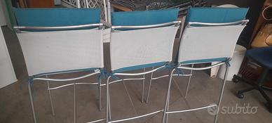 3 sgabelli colore grigio con le fodere 