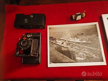 Fotografia d'epoca raffigurante il REX + macchina 