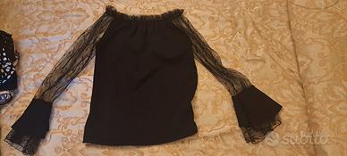 Blusa nera con maniche lunghe in tulle - elegante