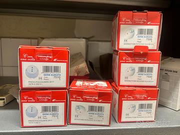 1 deviatore, 3 interruttori e 2 prese poiivalenti