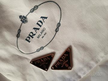 coppia triangoli Prada