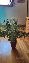vaso in legno d'ulivo con fiori finti