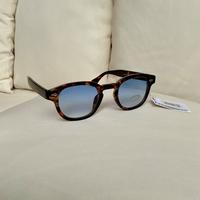 Occhiali da sole tartarugati con lenti azzurre