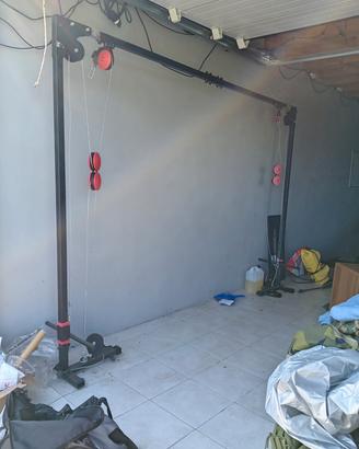 Attrezzo crossover cavi palestra 