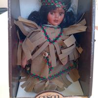 Bambola in porcellana Manitù vintage 